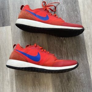 Nike Running Shoes.  Orange.  Size 12 Men.